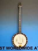 A Henderson banjo in vintage leather cas