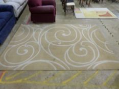 A beige rug with swirl design