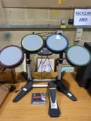 A Playstation drum set together with Res