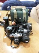 Two SLR cameras, (one Fujica one Ricoh)
