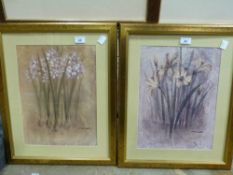 A pair of modern gilt framed prints of f