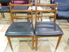 Two retro leather seated chairs
