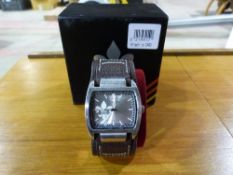 A cased Henleys gents watch