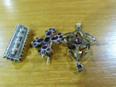 A Victorian yellow metal pendant stamped