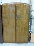 A burr walnut Art Deco style wardrobe