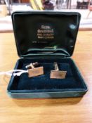A cased pair of Beau Brummel cufflinks
