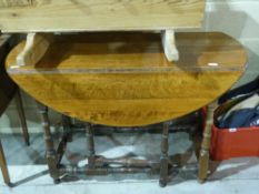 An oak gateleg table