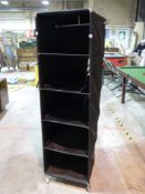 A set of clothes or similar shelves on w