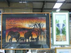 A large silk picture of elephants togeth