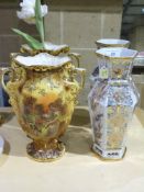 Two pairs of decorative vases, one with