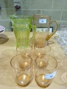 A peach glass lemonade set comprising ju