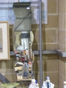 Three modern mirrors including one wavy