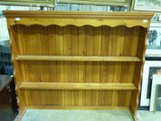 A pine dresser top with plate racks and