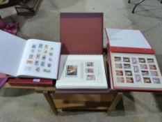 Four various stamp albums containing mai