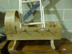 A pine crib together with a stand for a