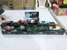 A quantity of Corgi classic sports cars