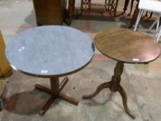 A Georgian oak tripod table together wit