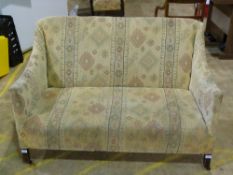A small Edwardian two seat sofa