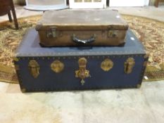 A vintage suitcase with LMS Nailsworth l