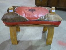 A vintage camel stool