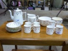 A gilt ceramic coffee service