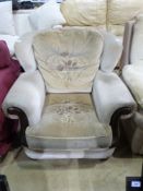 An armchair with floral upholstery