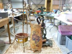 Two stick stands and a large jug