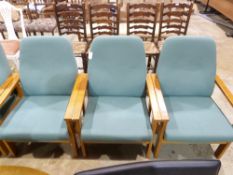 A set of six green upholstered modern ar