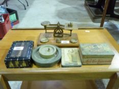 A set of postage scales, porcupine quill