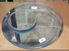 A selection of circular bevelled mirrors