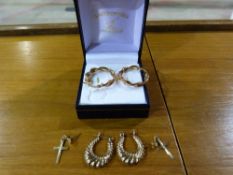 Three pairs of yellow metal earrings, ea