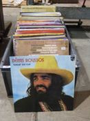 A box of mixed records