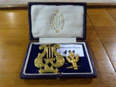 An 18ct gold double eagle pendant weight