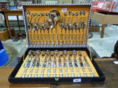 A cased set of plated cutlery