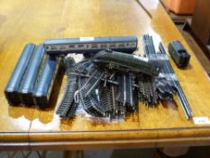 A 00 gauge Mallard with coaches and trac