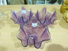 Three various purple handkerchief vases