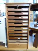 An Abbess oak tambour fronted nine drawe