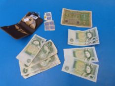 A quantity of English £1 notes, some cri