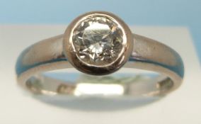 An 18ct white gold ring set with a round