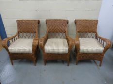 Three wicker conservatory style chairs