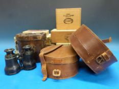 A collection of cigar boxes, leather cas