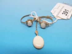 Two 9ct gold rings set with opals togeth