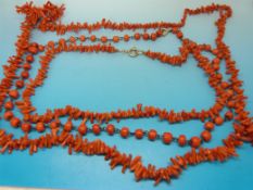 Three strings of coral necklaces includi