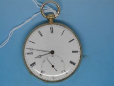 A yellow metal key winding slim gentlema