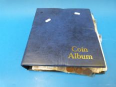 A blue coin collector's album of world c