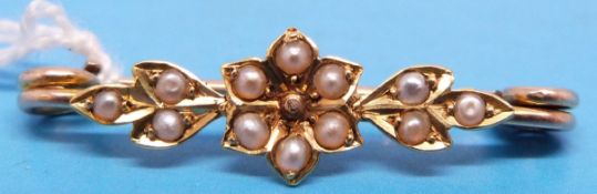 A yellow metal Victorian/ Edwardian bar