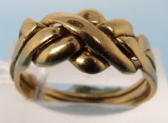 A yellow metal ring marked 18ct in a pla