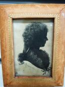 A silhoutte of a lady entitled 