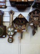 A circa 1950 three train cuckoo clock wi