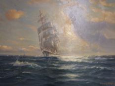 A framed oil on canvas of a sailing ship